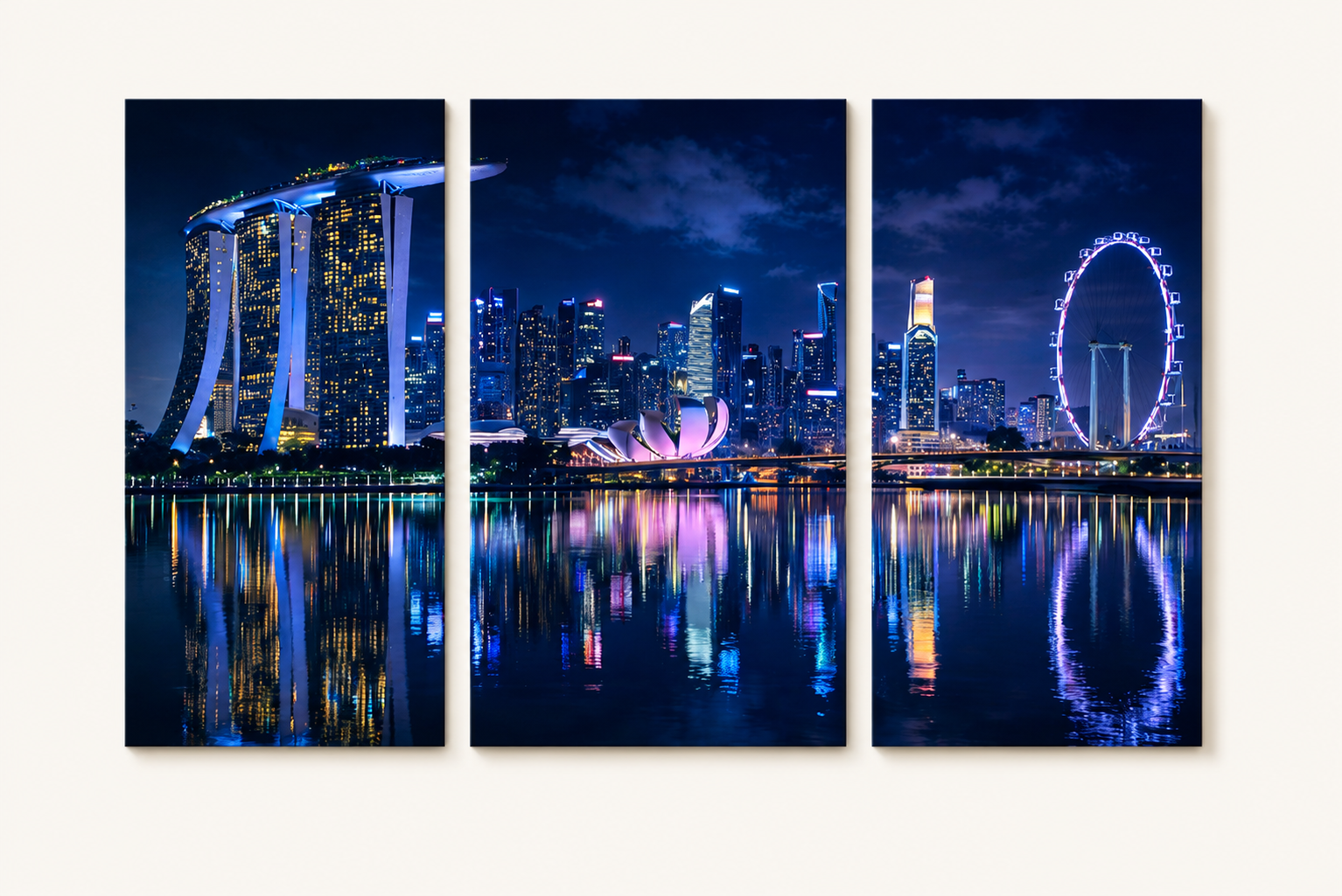 3 Panel artwork of a city skyline at night with illuminated buildings and reflections.